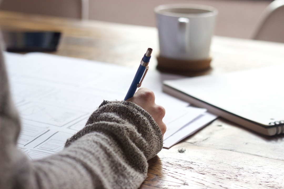 Crafting Captivating Headlines: Your awesome post title goes here Designer sketching Wireframes